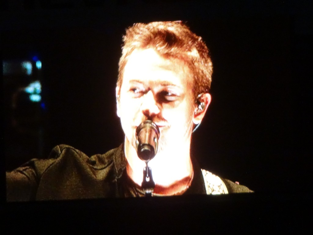 Hunter Hayes is projected on the screen at Chevy Court.
