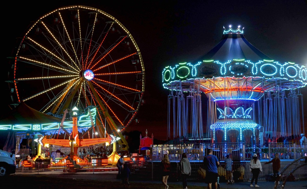 The midway is exciting and dazzling after dark. Even if you don't go on rides, a stroll among the neon artistry is a thrill.  